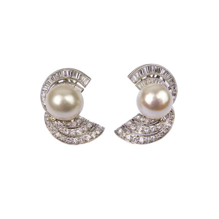 Pair of mid-20th century pearl and diamond scroll cluster earrings, each set with a domed white pearl